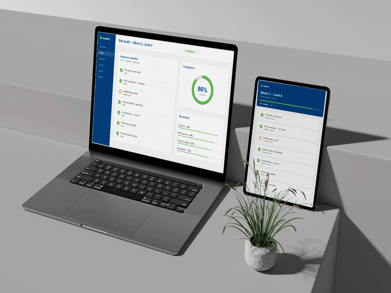 AuditPro shown on a tablet and laptop on a neutral surface