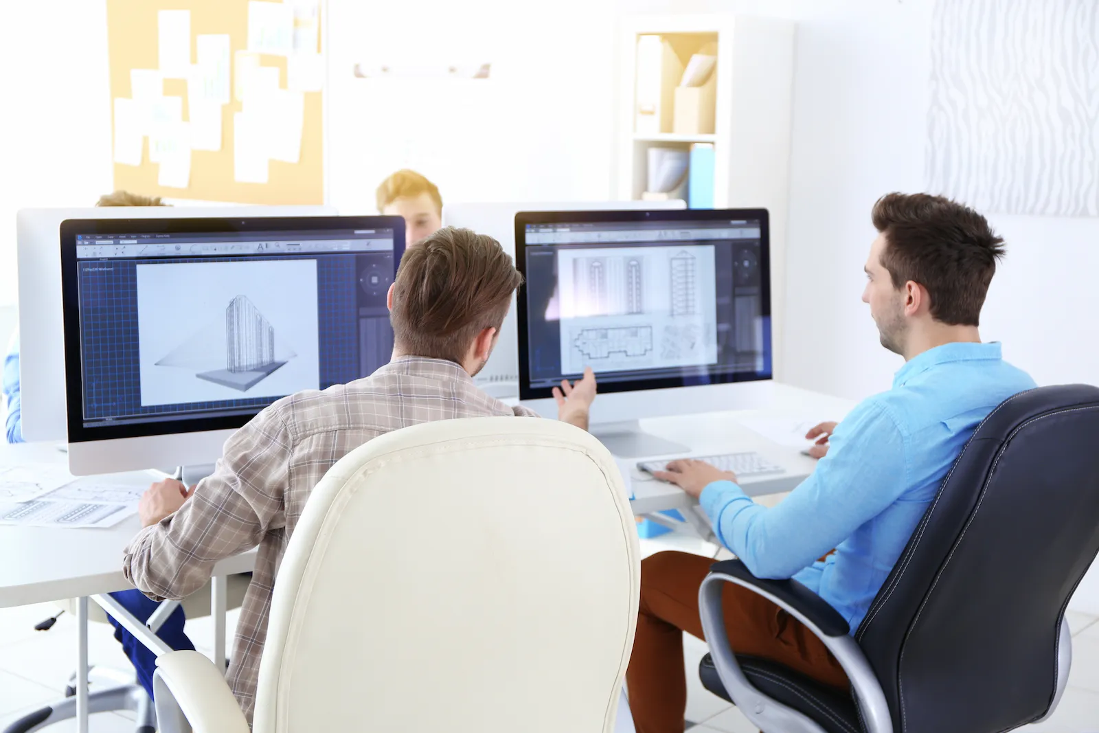 Star-Knowledge Engineering Services digital modeling team utilizing advanced CAD software for structural design on the homepage about section.